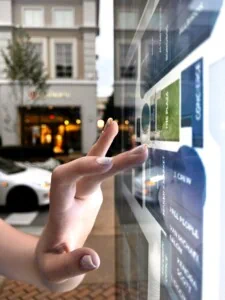 A hand touches a digital screen zoomed in