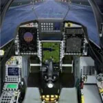 A cockpit of a fighter jet with a lot of control panels