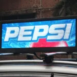 A digital sign on top of a vehicle